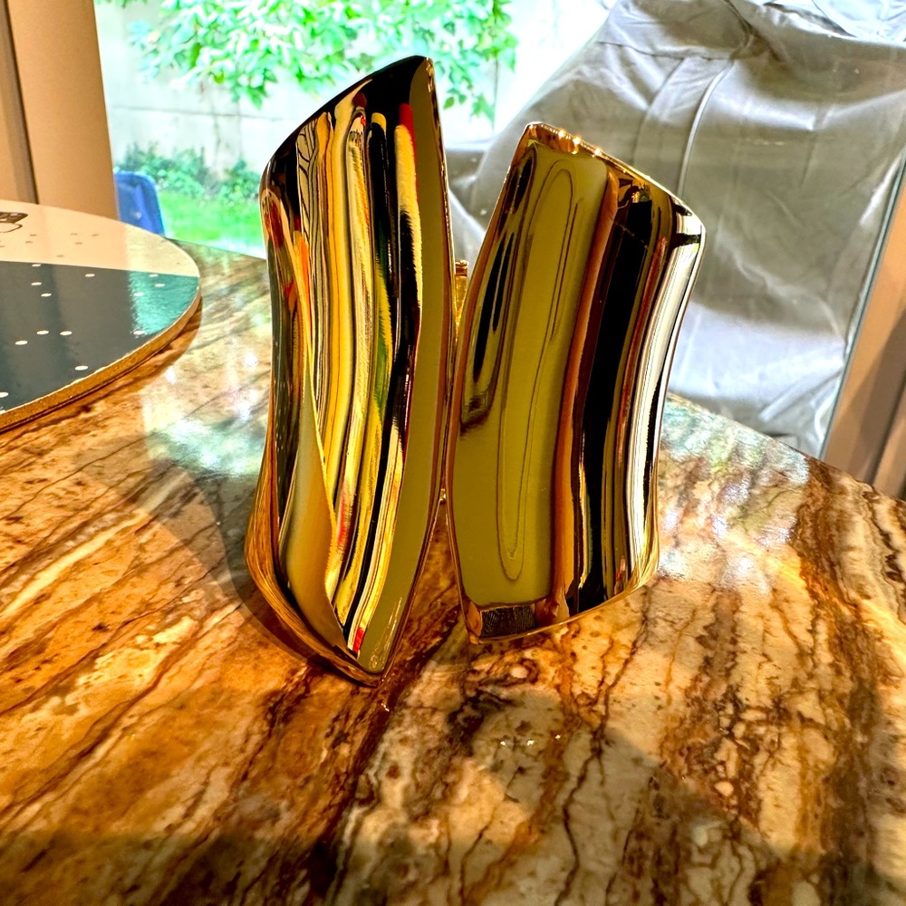 Wide cuff bracelet. Beautifully textured golden.